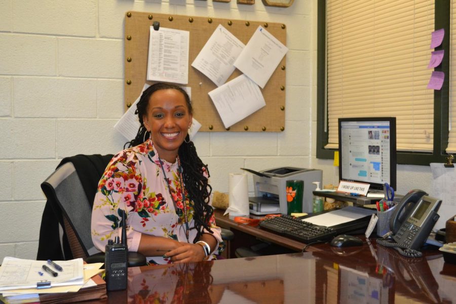 Sitting at her new desk, Assistant Principal Lashonda Reed works toward making students’ lives easier.