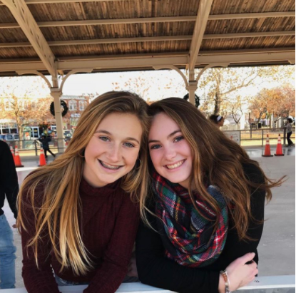Ice-skating sophomores Amanda Deliee and Kylie Warren bundle up in stylish winter trends.