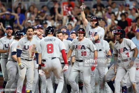 MIAMI, FL - MARCH 18:  Members of Team USA celebrate after Trea Turner #8 hit a grand slam in the eighth inning during the 2023 World Baseball Classic Quarterfinal game between Team USA and Team Venezuela at loanDepot Park on Saturday, March 18, 2023 in Miami, Florida. (Photo by Rob Tringali/WBCI/MLB Photos via Getty Images)