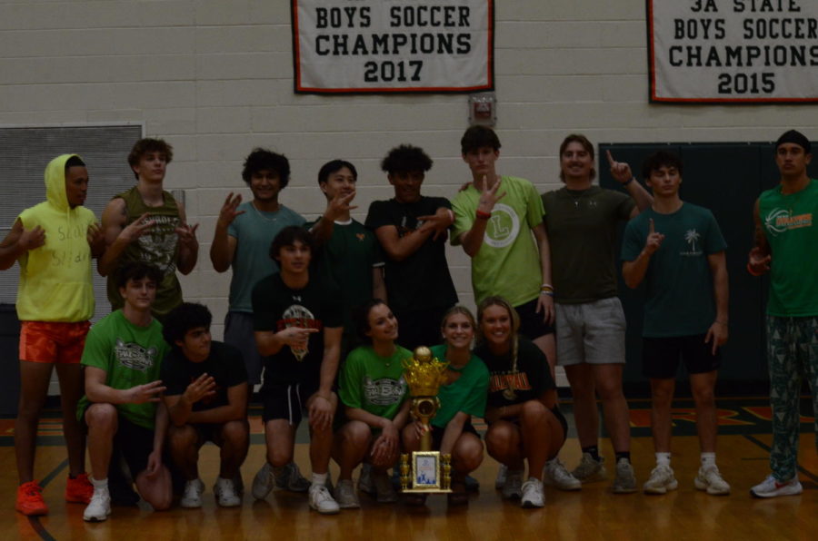 The Senior Powder Buff team poses with the trophy following their win over the juniors.