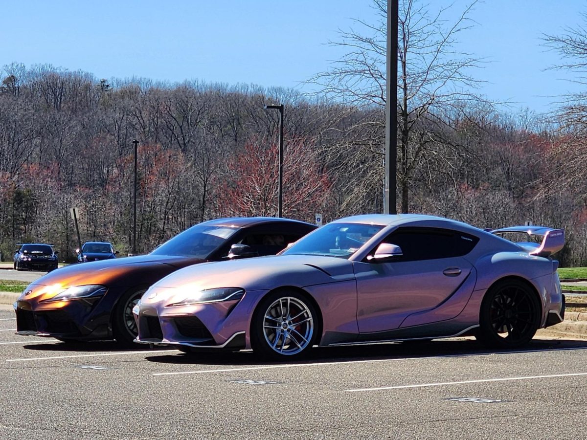 Two cars at KRHS Car Club first ever  car meet!